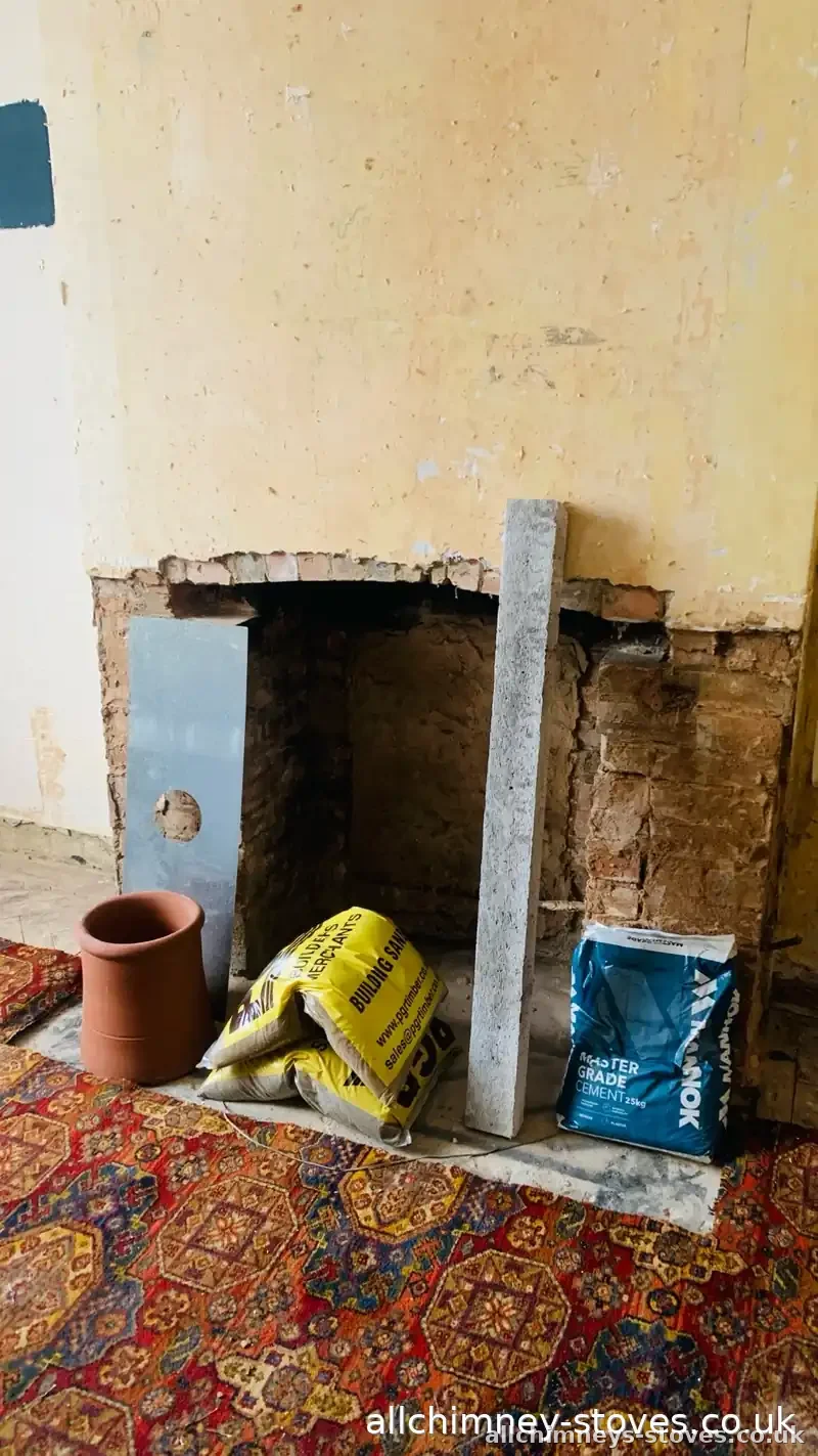 HETAS certified full fireplace conversion — builder's opening reinstated, register plate fitted prior to stove install, Allchimney Stoves, Emerson Park