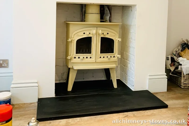 HETAS certified wood burning stove installation — Charnwood almond respray Villager double door stove, slate hearth, Allchimney Stoves, Harold Wood