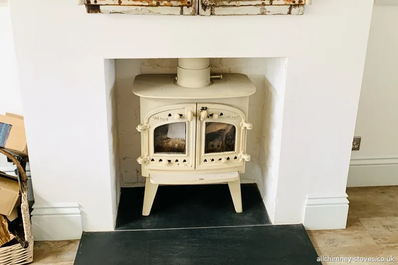 Villager double door wood burning stove, fully serviced and resprayed in Charnwood Almond high temperature paint, plastered fireplace opening, slate hearth, Harold Wood