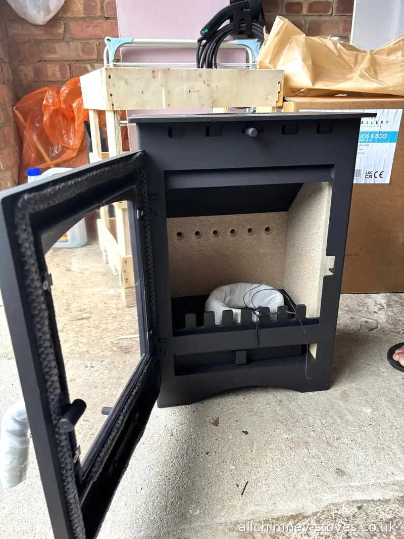 Gallery Helios 5 Eco wood burning stove unpacked and inspected prior to installation, vermiculite lined firebox, Romford